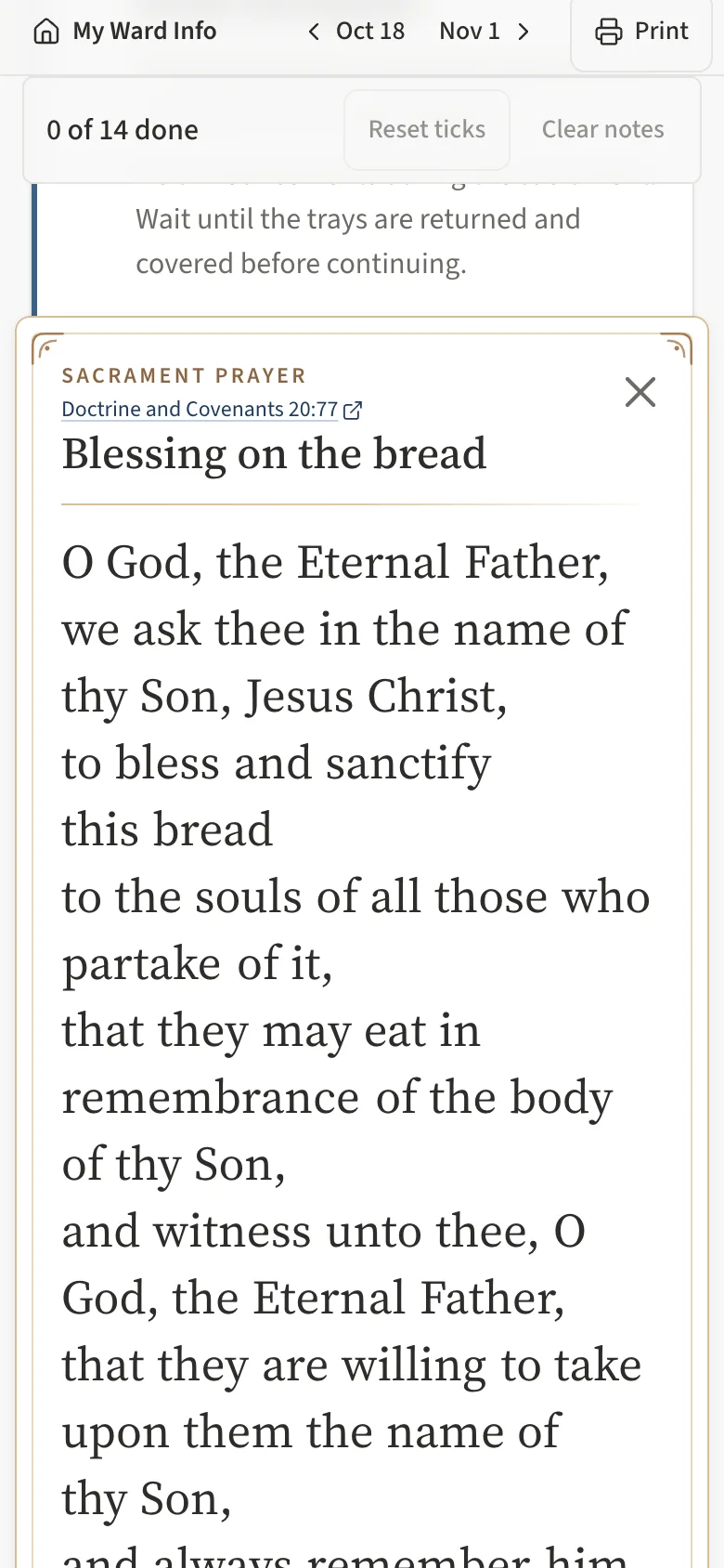 The sacrament prayer card on a phone: the scripture reference, Blessing on the bread with the X to close, and the prayer in large type, one phrase per line.